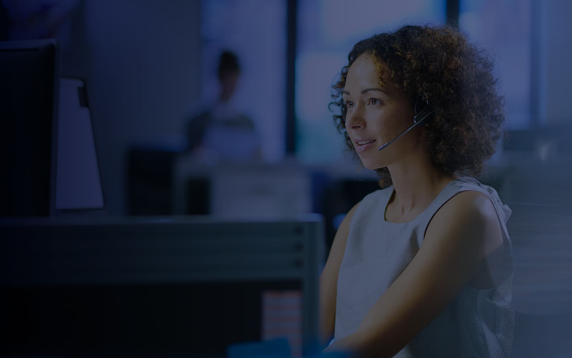 Office worker looking at computer screen