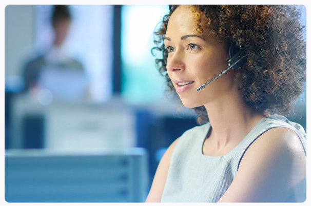 Female support team representative wearing a headset at FOREX.com offices