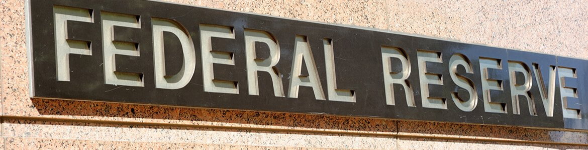 Federal reserve name plaque on building