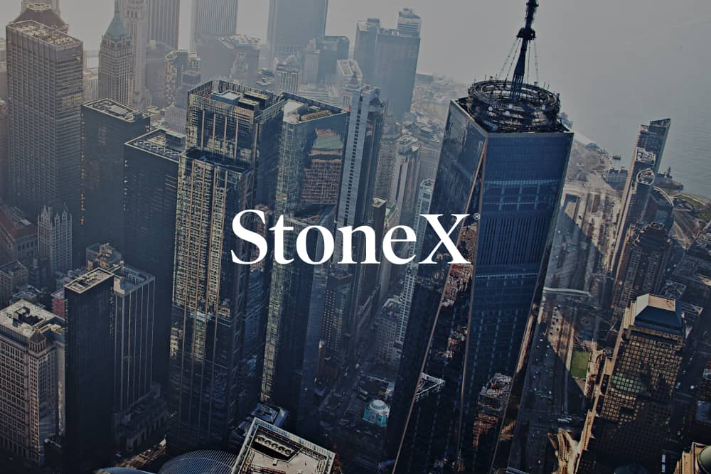 StoneX logo against background of city