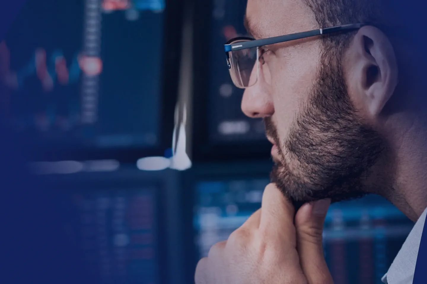 Market Strategist looking at screen