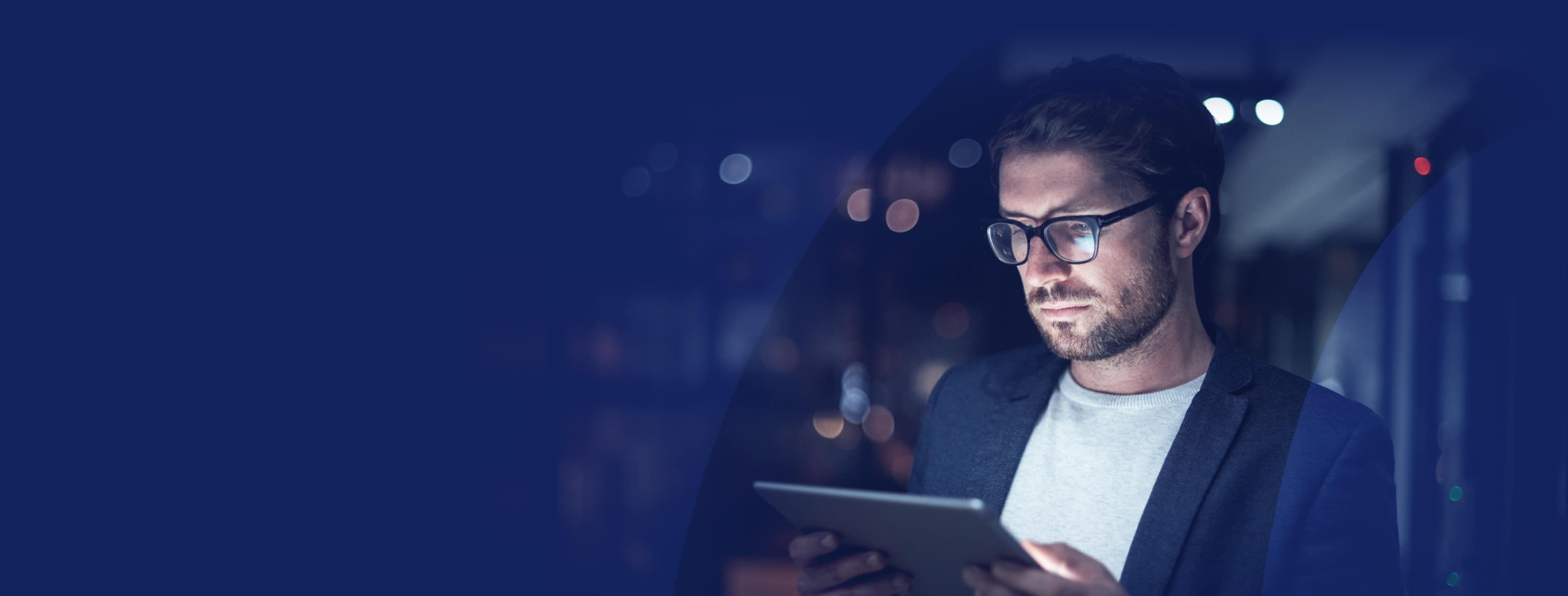 Trader looking at Forex app on a tablet