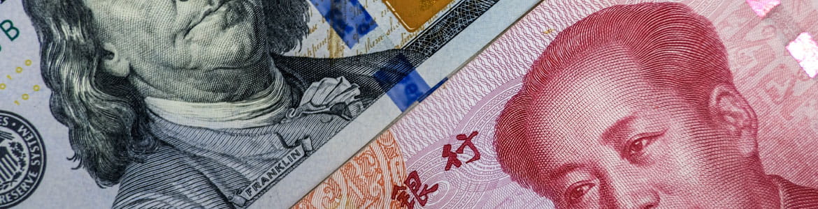Close up of USD vs China currency bank notes